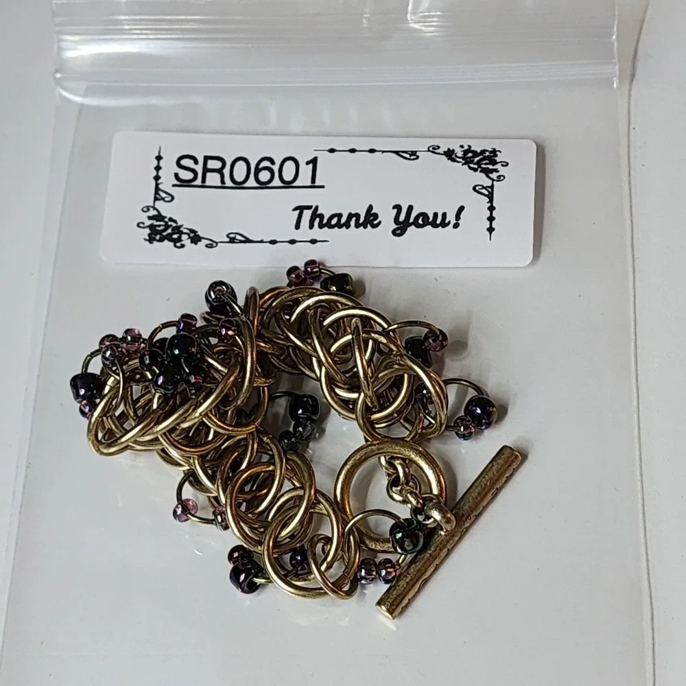 Kenneth Cole Gold Tone Woven Ring Bracelet Purple Bead Chunky Toggle Statement